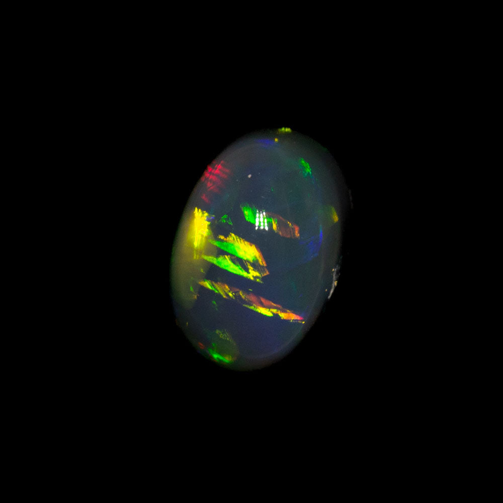 1.72 ct double-sided black opal 8x5.7x5.7mm