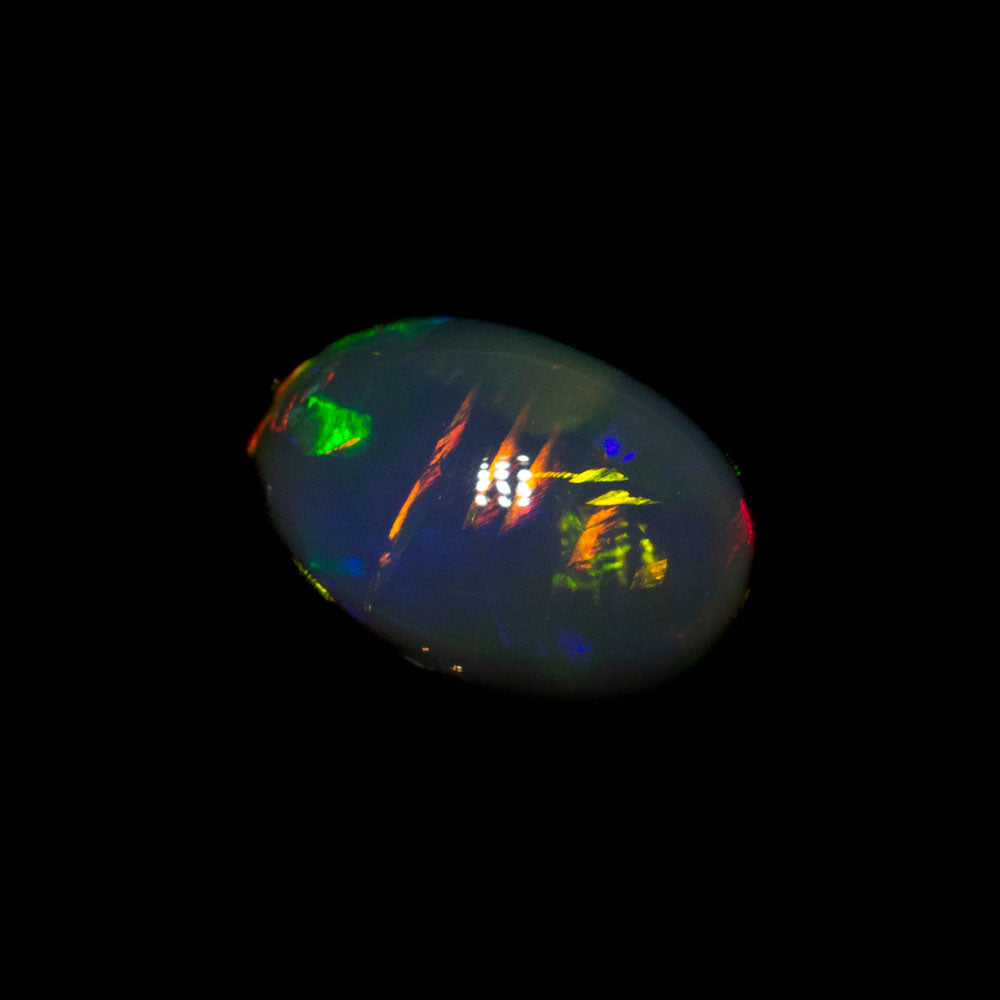 1.72 ct double-sided black opal 8x5.7x5.7mm