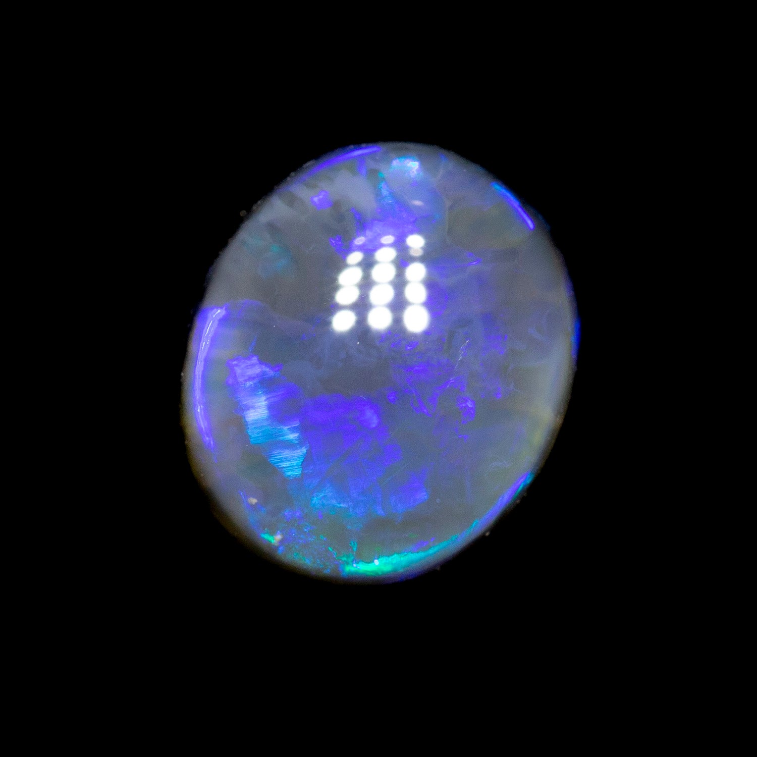 1.73 ct black opal 8x6.8x4.6mm