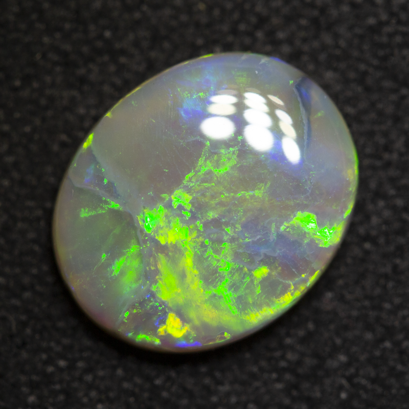 1.74 ct dark opal 9.9x8.1x2.9mm