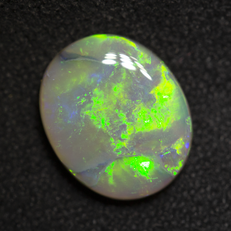 1.74 ct dark opal 9.9x8.1x2.9mm