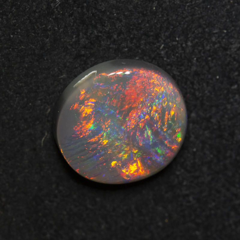 1.74 ct dark opal 9.1x8.4x3.5mm