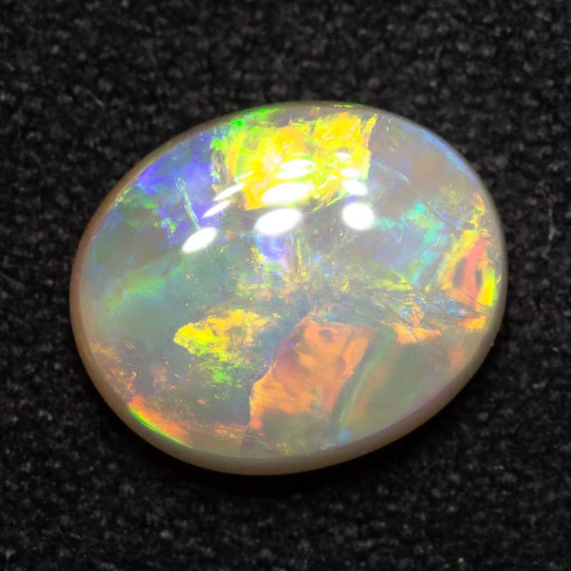 1.84 ct dark opal 9.2x7.6x3.8mm