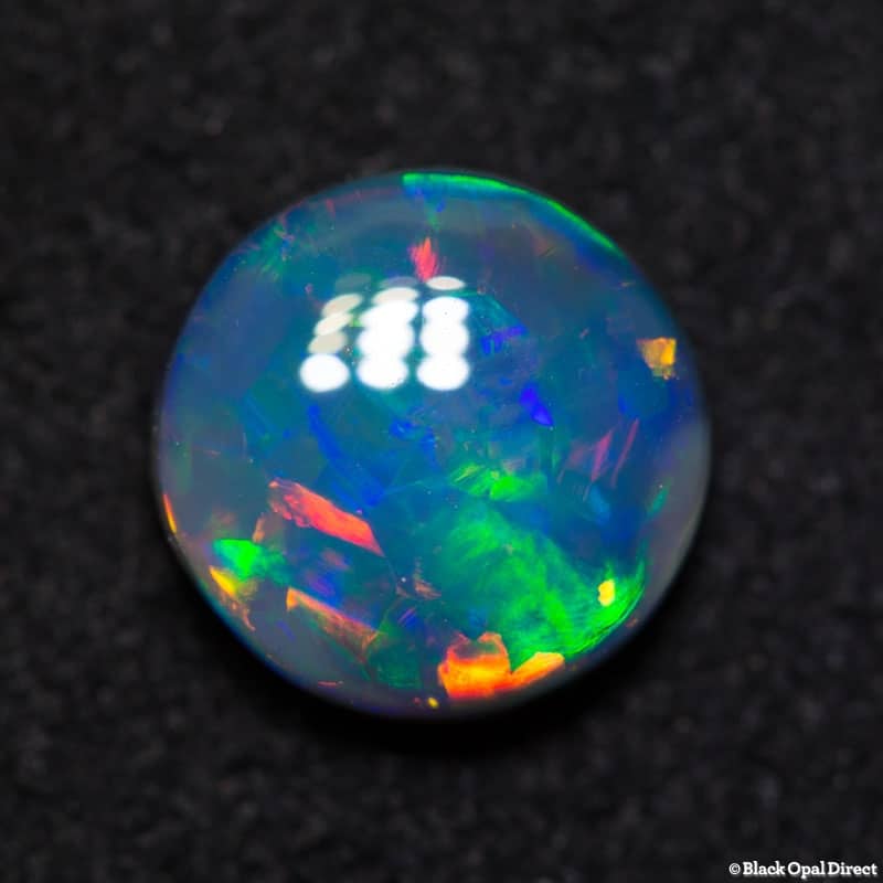 1.84 ct green red dark opal