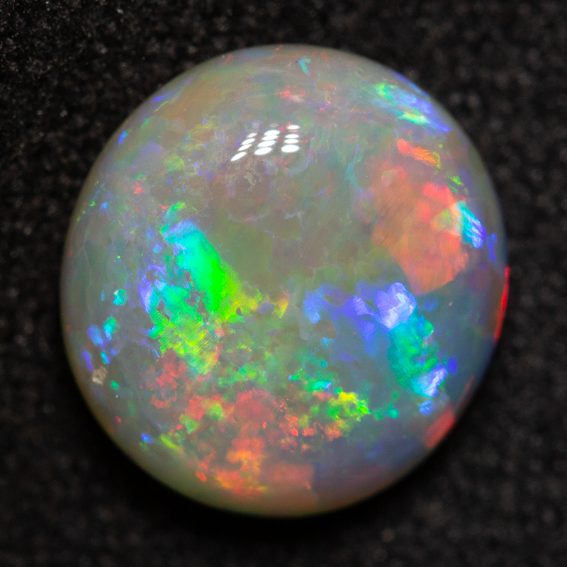 1.88 ct dark opal 8.9x8.5x3.8mm