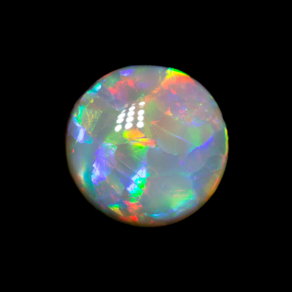 1.88 ct dark opal 9x8.8x3.7mm