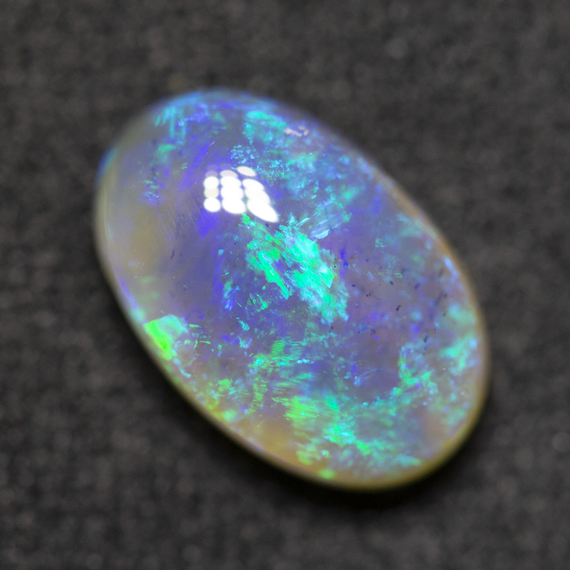 1.93 ct dark crystal opal 10.2x6.6x4.7mm