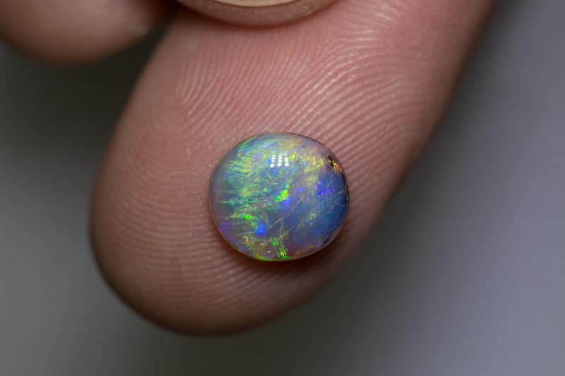 1.94 ct dark opal 9x8.5x4mm