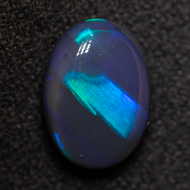 1.95 ct black opal 9.5x6.7x4.6mm