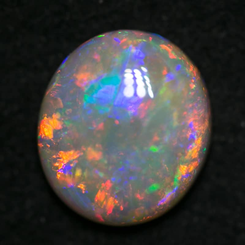 1.95 ct dark opal 9x8x3.5mm