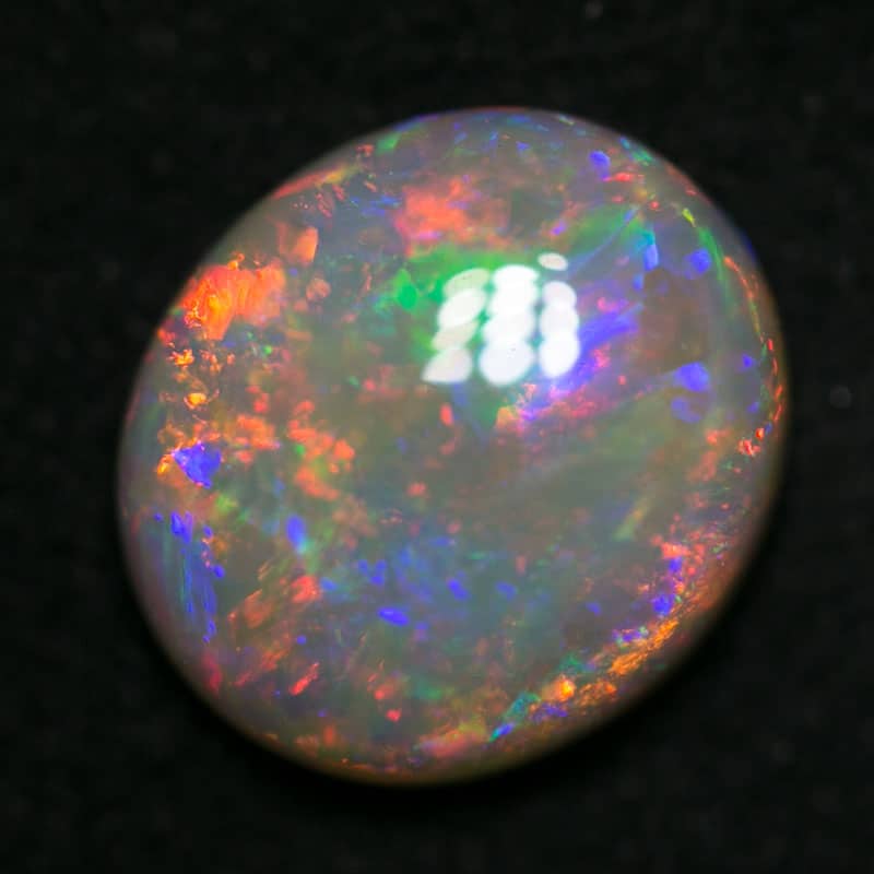 1.95 ct dark opal 9x8x3.5mm