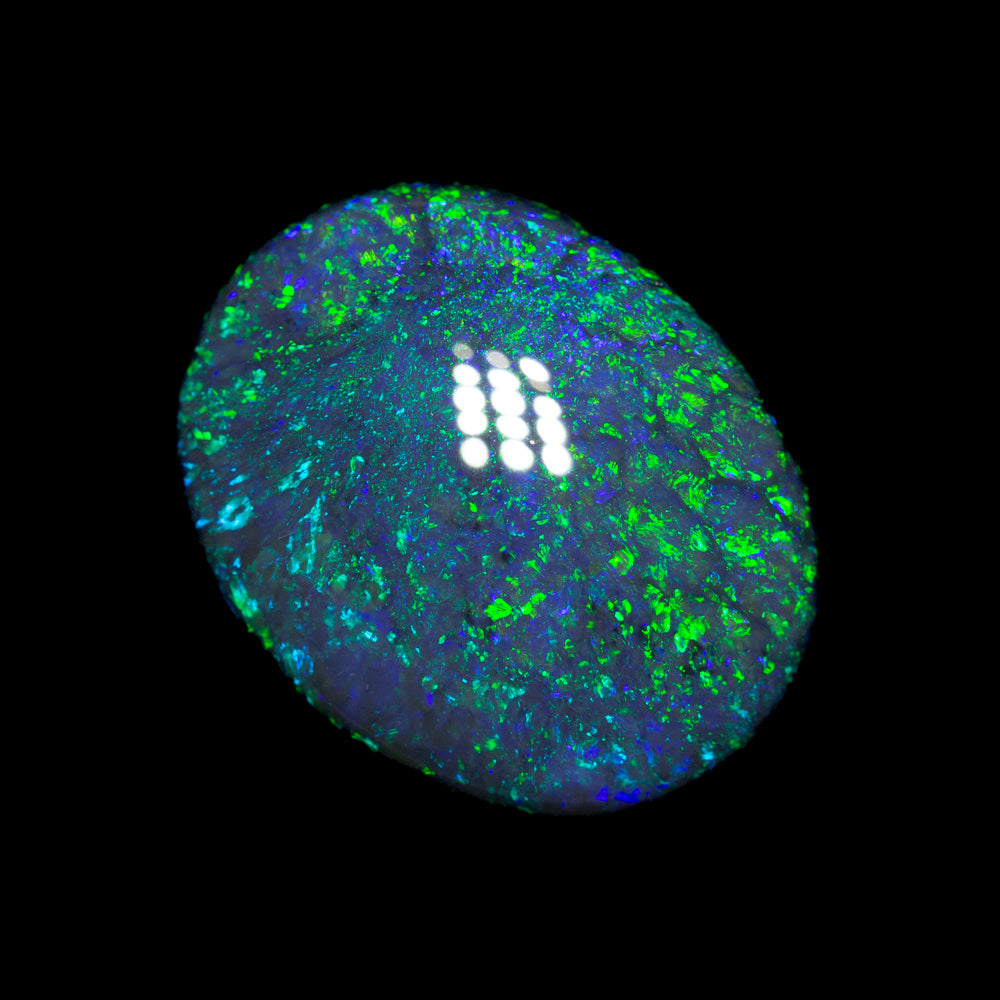 10.84 ct black opal 18x14.2x6.6mm
