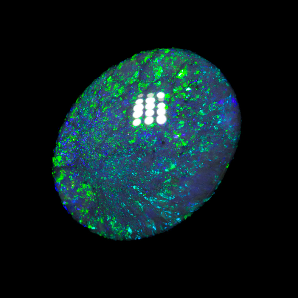 10.84 ct black opal 18x14.2x6.6mm