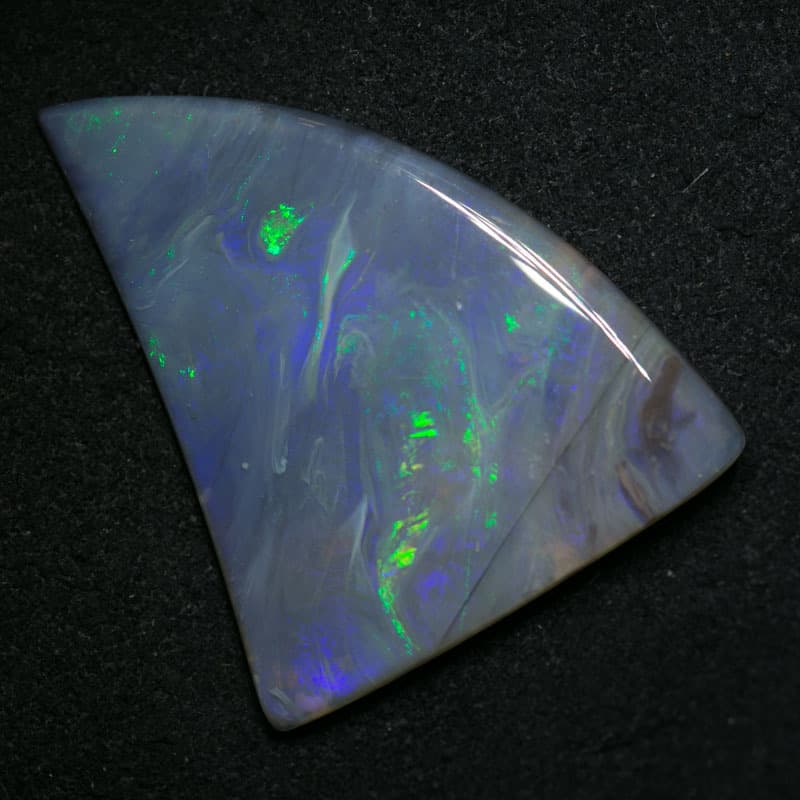 11.17 ct shark tooth shaped opal 28x22x3mm