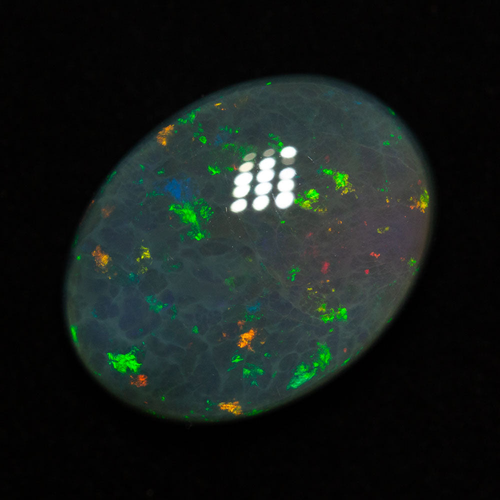 12.09 ct black opal 18.7x14.2x7mm
