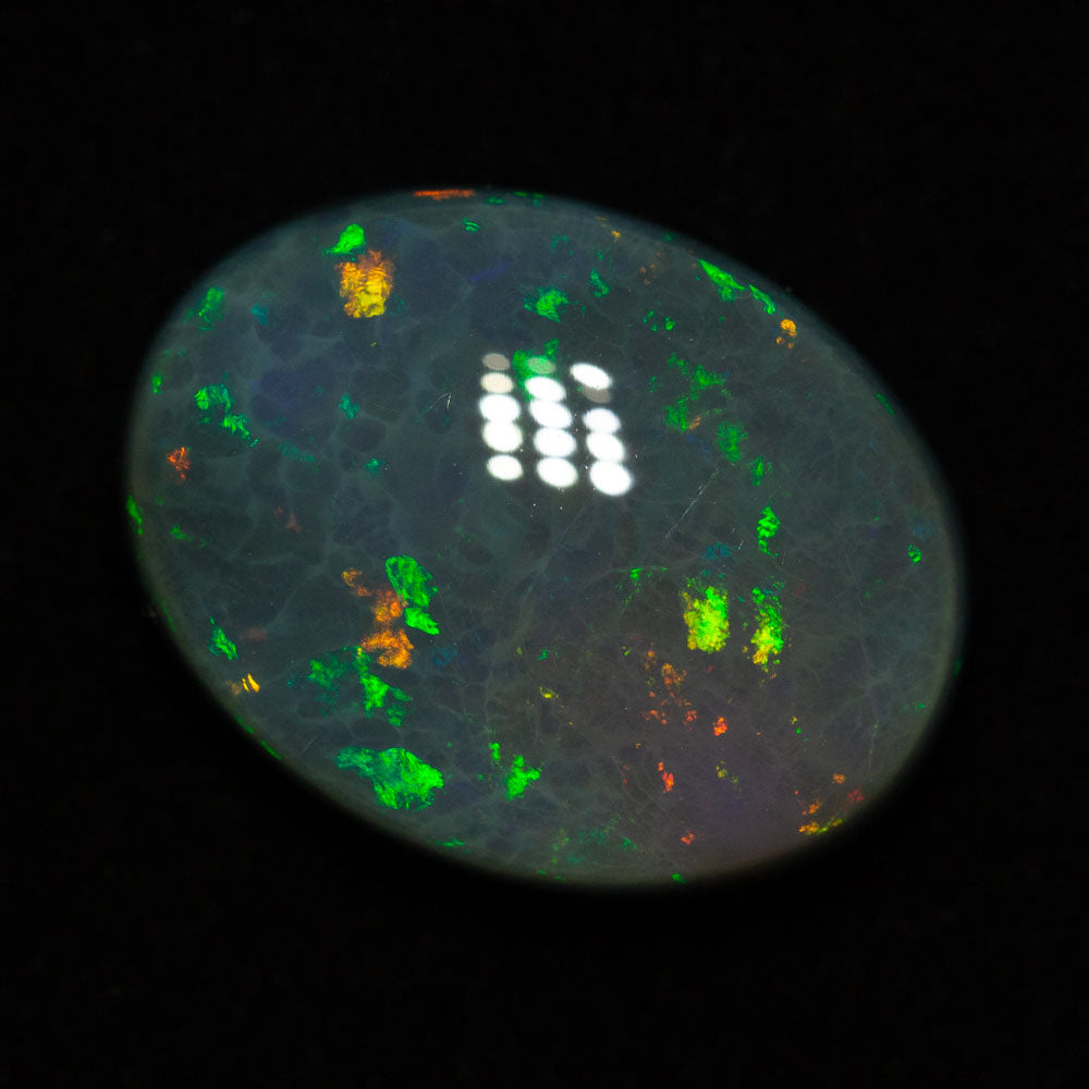 12.09 ct black opal 18.7x14.2x7mm