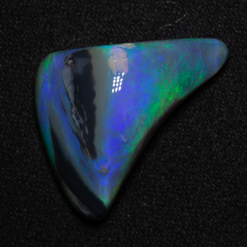 12.39 ct dark opal 22.2x14.2x8.1mm