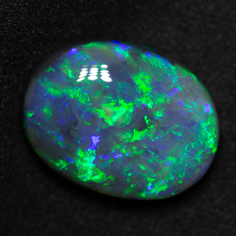13.80 ct black opal 19.1x14.4x7.9mm