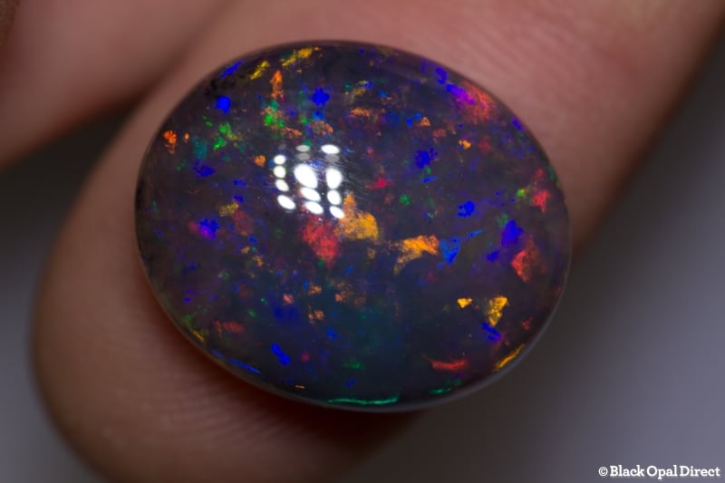 14.73 ct gem black crystal opal 19x16x8mm