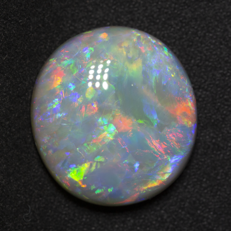 15.69 ct dark opal 18.7x17.4x7.8mm