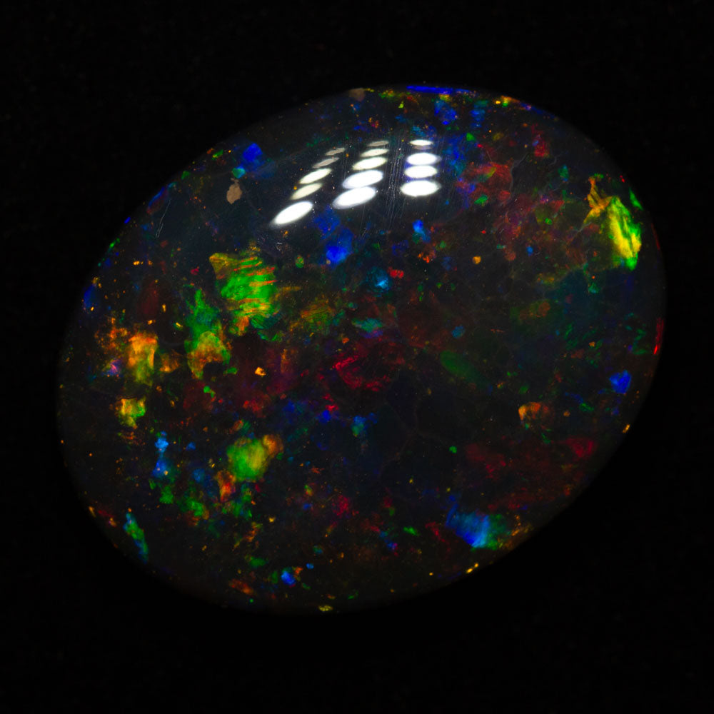 15.83 ct gem black opal 22.2x17.5x6.3mm