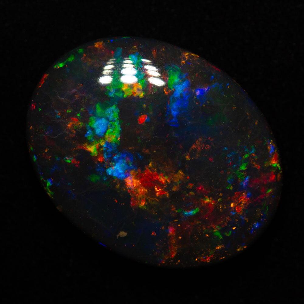15.83 ct gem black opal 22.2x17.5x6.3mm