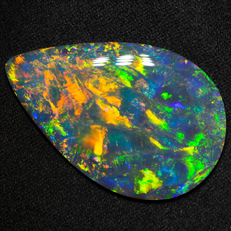 15.90 ct gem black opal 34x21.6x3.7mm