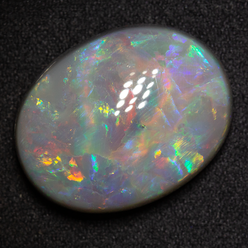 17.42 ct dark opal 21x16x8 mm