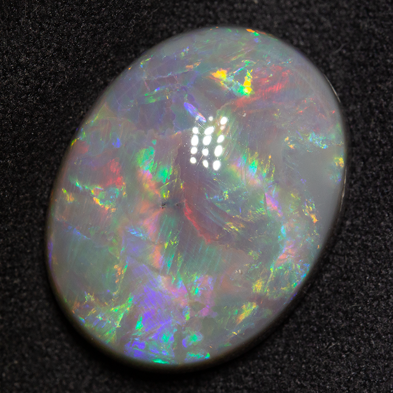 17.42 ct dark opal 21x16x8 mm