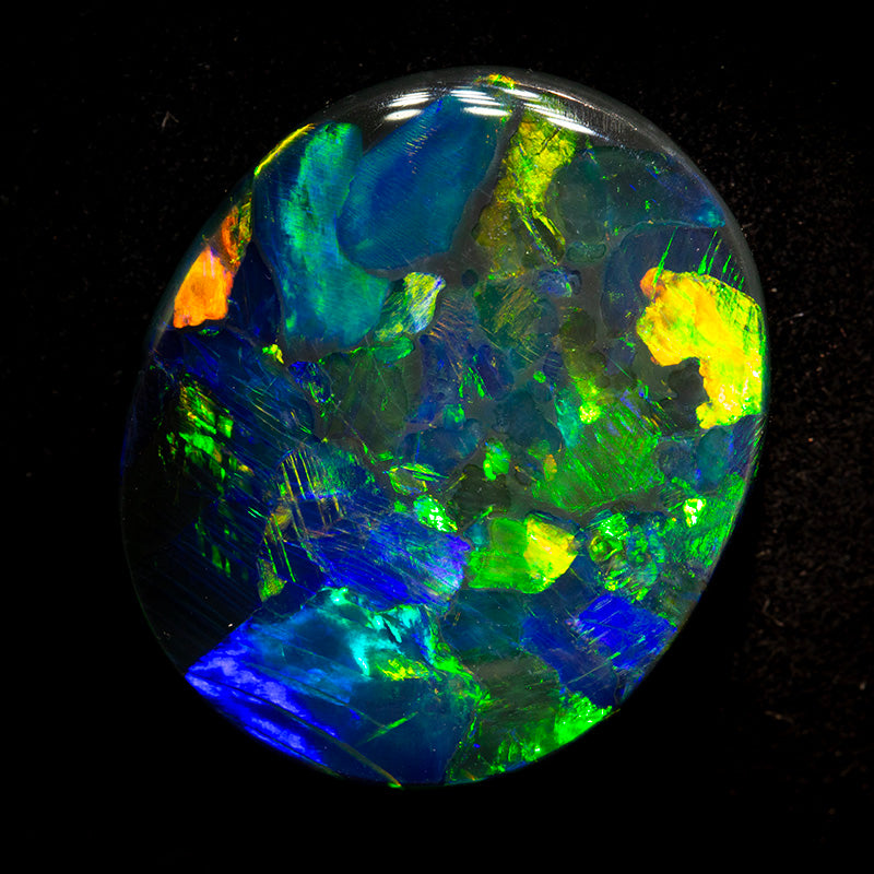 17.56 ct gem black opal 25.7x21.8x4.4mm