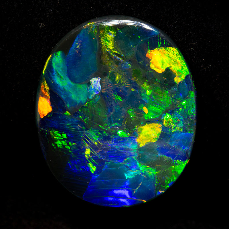 17.56 ct gem black opal 25.7x21.8x4.4mm