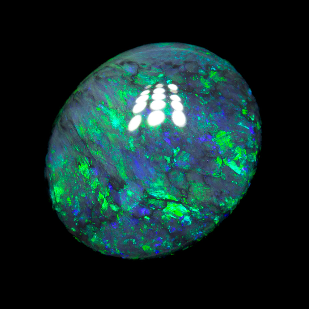 18.15 ct black opal 18.8x16.2x9.2mm