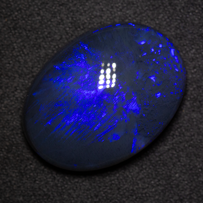 19.09 ct black opal 22.9x17x8.2mm