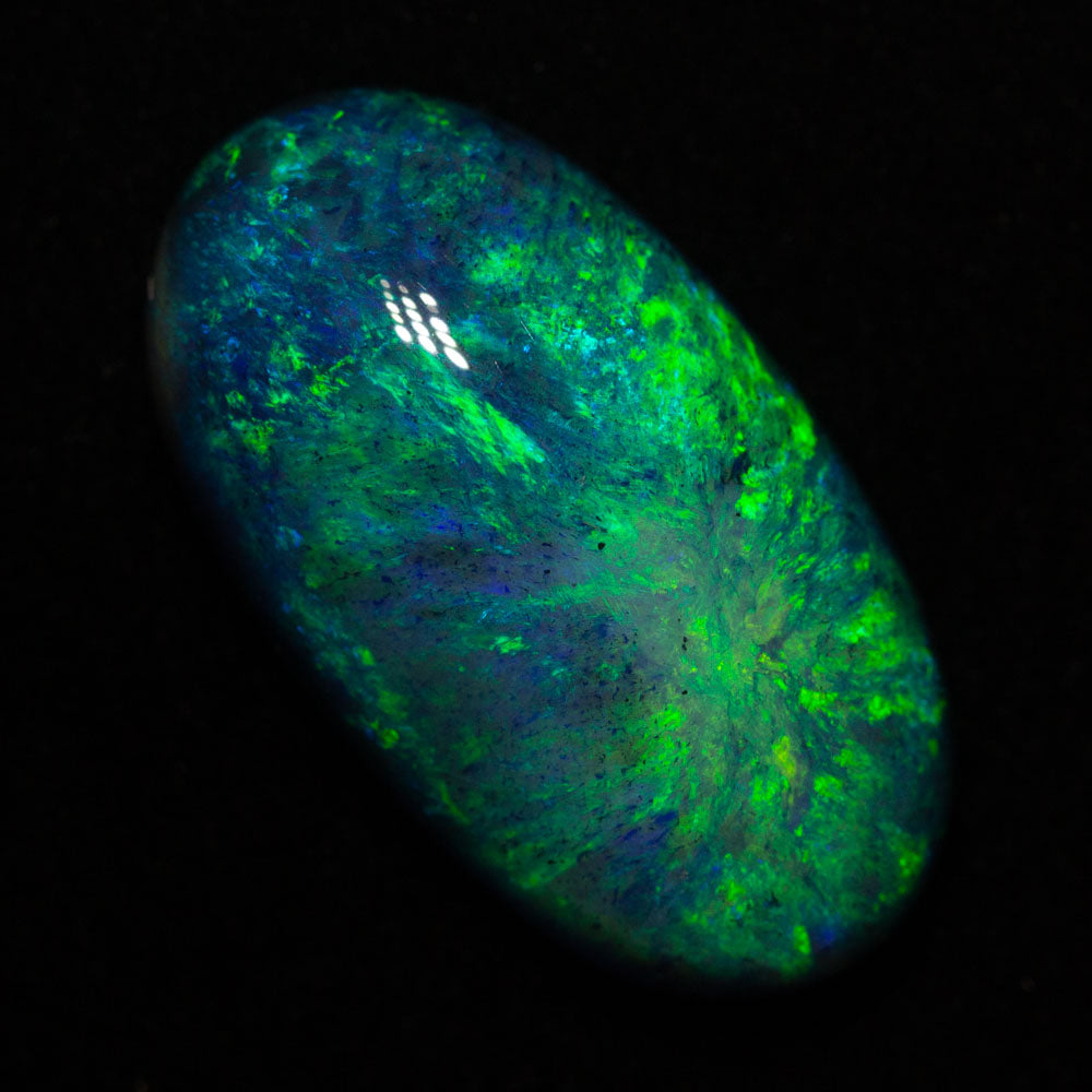 19.84 ct black opal 25.5x14.1x8.6mm