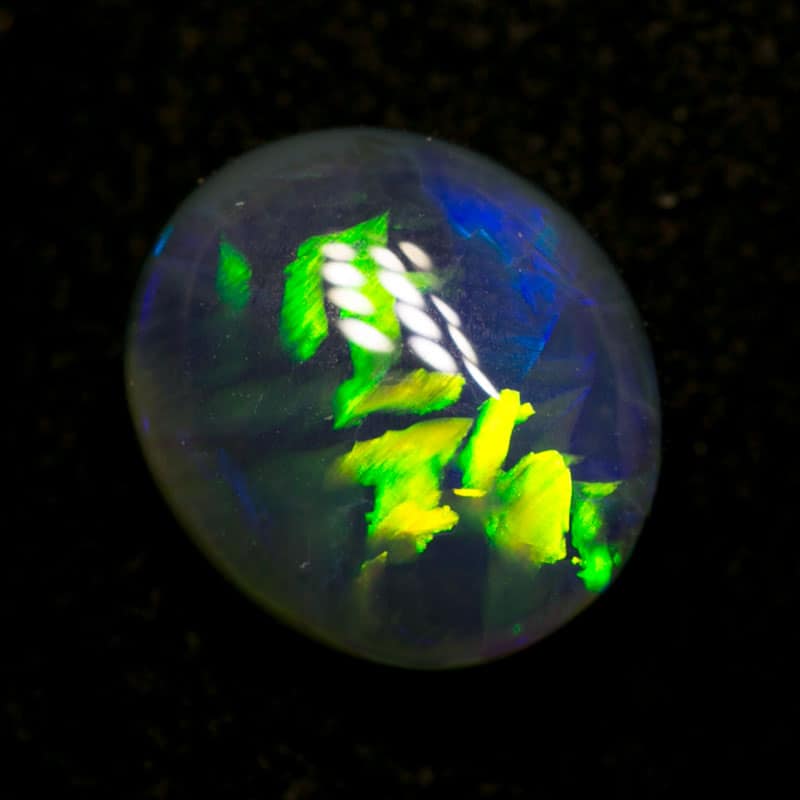 2.01 ct gem black opal with Chinese writing 9x8x4mm Slessor