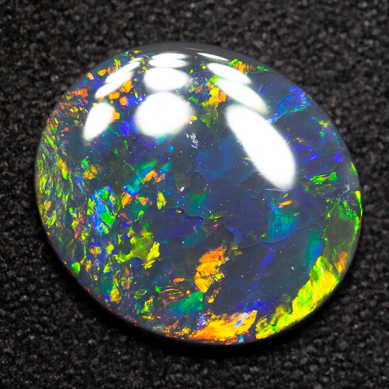 2.03 ct black opal 12.1x10.7x2.1mm