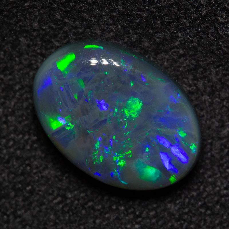 2.08 ct double-sided black opal 10.3x7.3x4.3mm