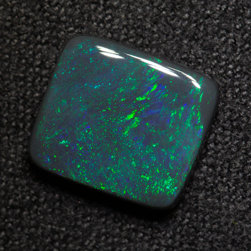 2.19 ct black opal 9.6x8.5x3.1mm