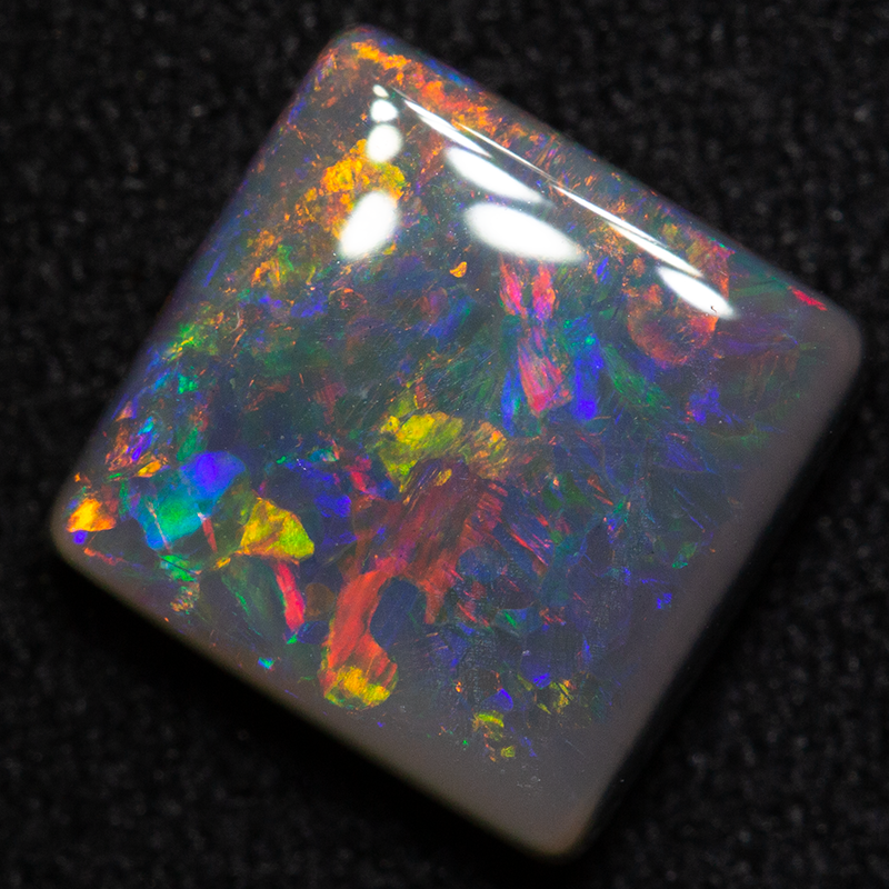 2.20 ct dark opal 8.6x8.5x3.5mm