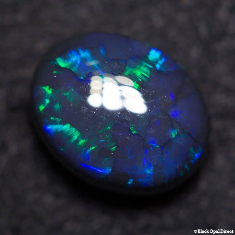 2.20 ct black opal 9.2x7.5x4.5mm