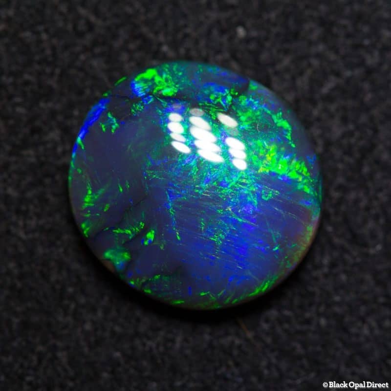 2.24 ct black opal 10x9.5x3.5mm
