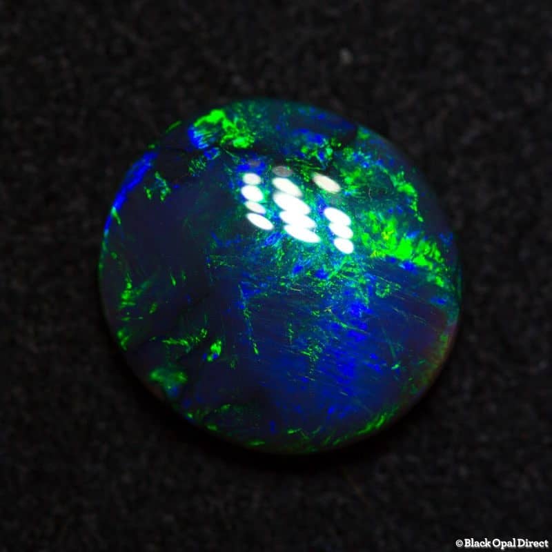 2.24 ct black opal 10x9.5x3.5mm