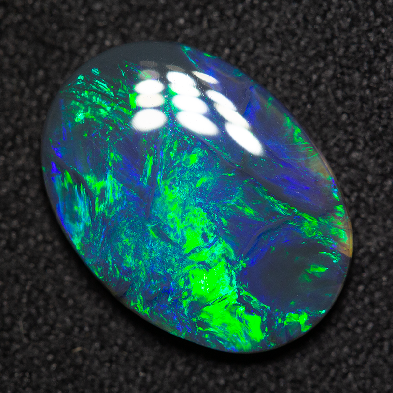 2.26 ct black opal 13.1x9.6x2.7mm