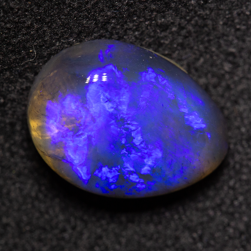 2.27 ct black crystal opal 10.9x8.1x4mm
