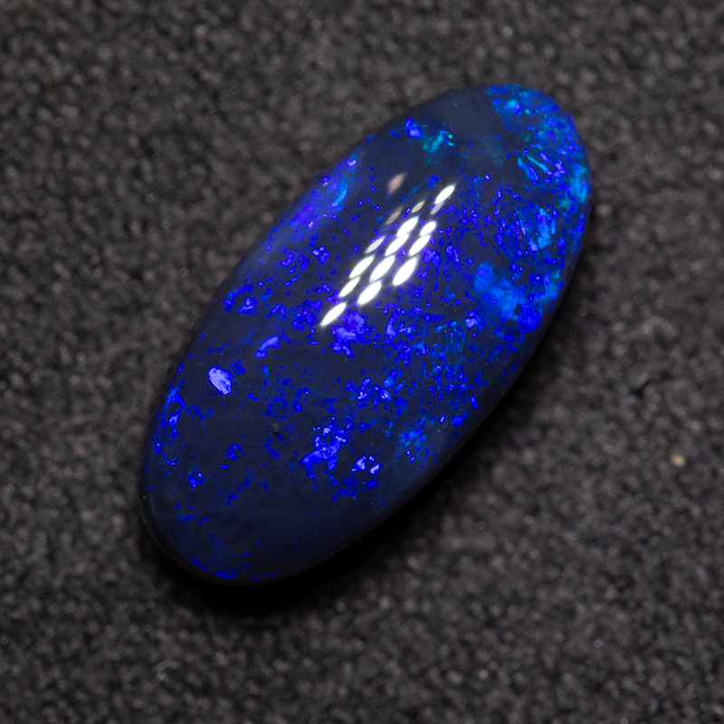 2.28 ct black opal 12.2x6x5mm