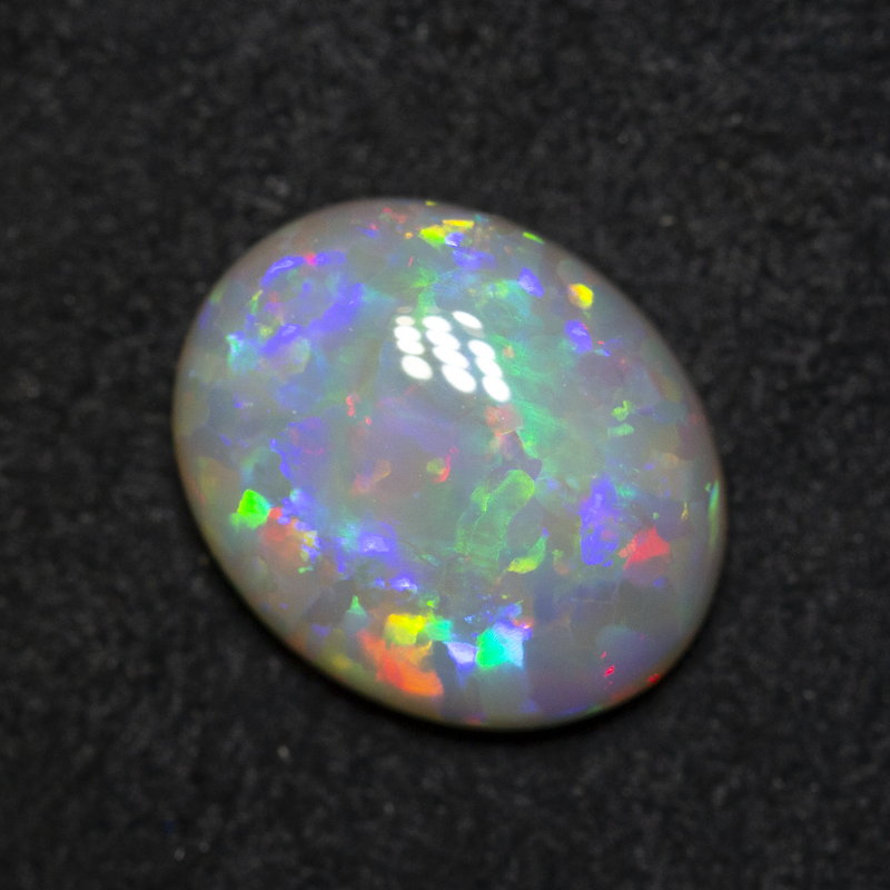 2.36 ct dark opal 10.7x8.7x3.9mm