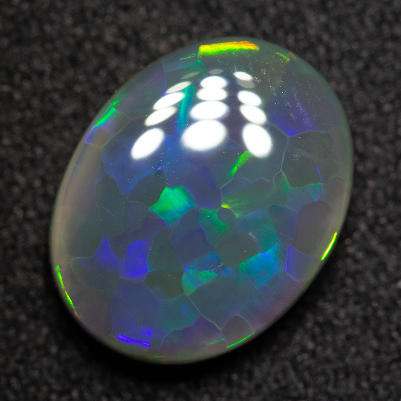 2.39 ct black opal 10.8x8.6x3.8mm