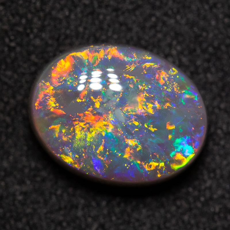 2.39 ct dark opal 10x7.8x4.5mm