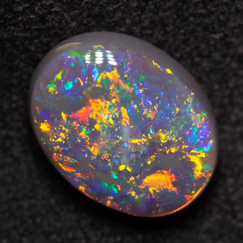 2.39 ct dark opal 10x7.8x4.5mm