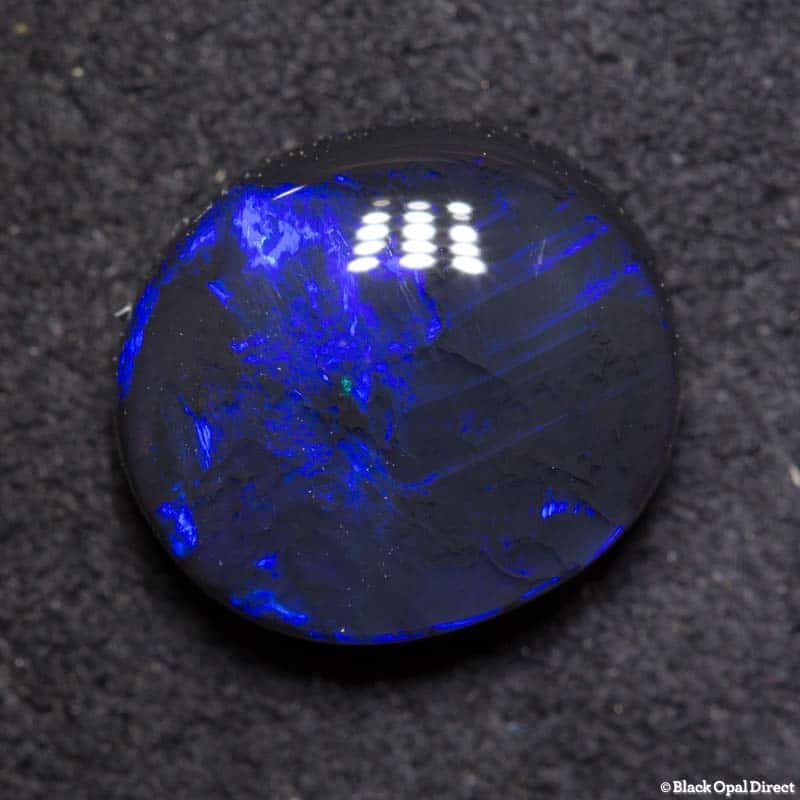 2.38 ct black opal 10x9x4mm